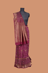 Dola silk wine bandhani saree with golden zari banarasi pallu and patola daaman
