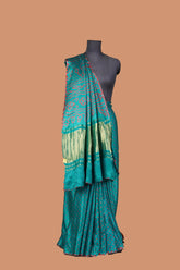 Gaji silk Turquoise and red dotted bandhani saree with golden lagdi patta