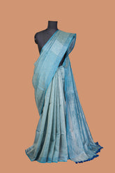 Blue tissue saree with golden zari patta