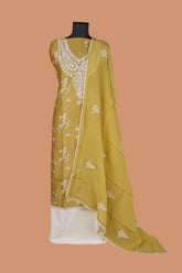 Musterd Yellow Chanderi Suit Set with Aari Dori Embroidered neck and White Border Lace