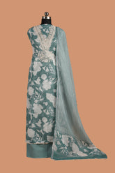 Ocean Teal Linen Suit Set with Aari Dori Embroidered neck and White Border Lace