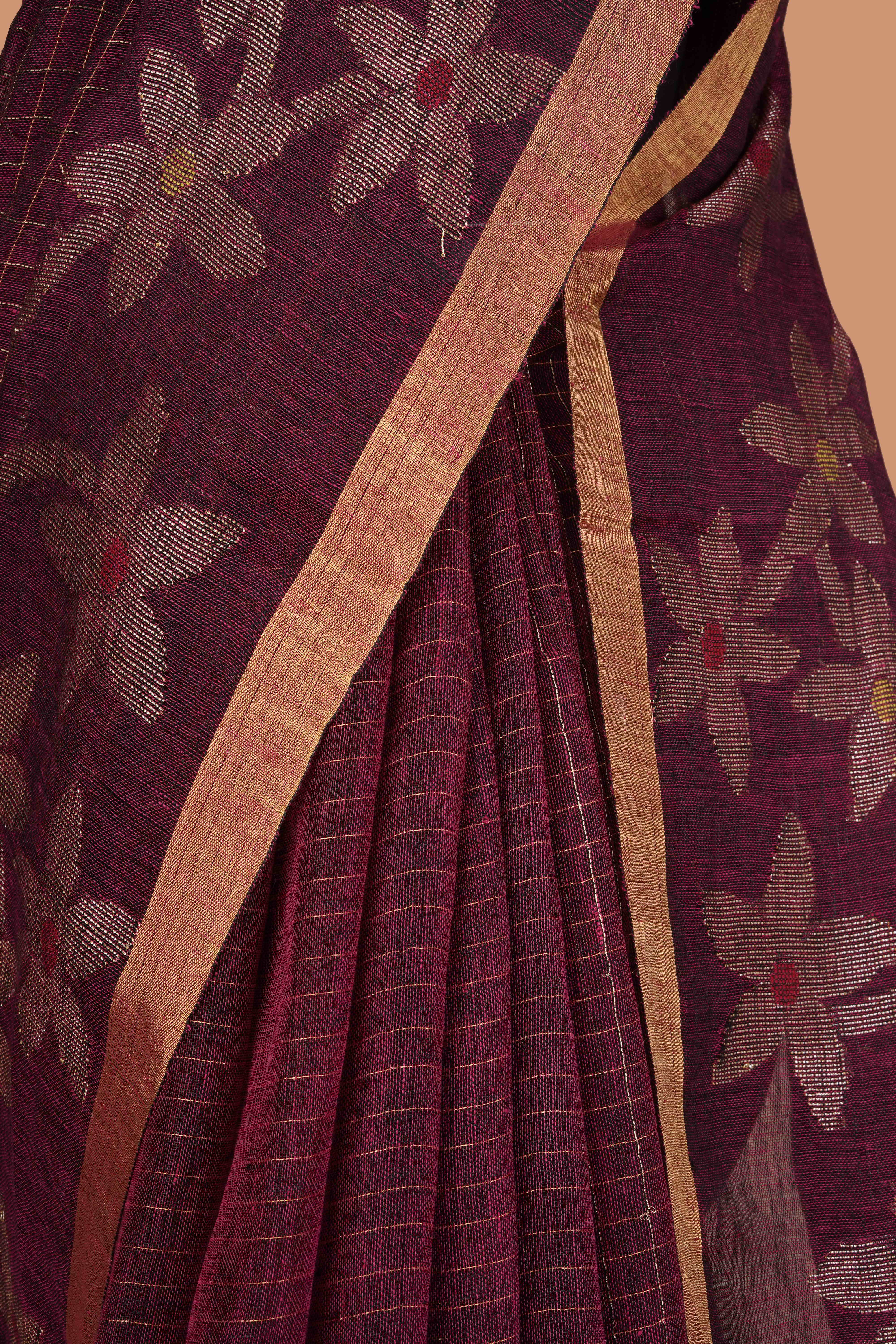 Wine linen saree with golden zari