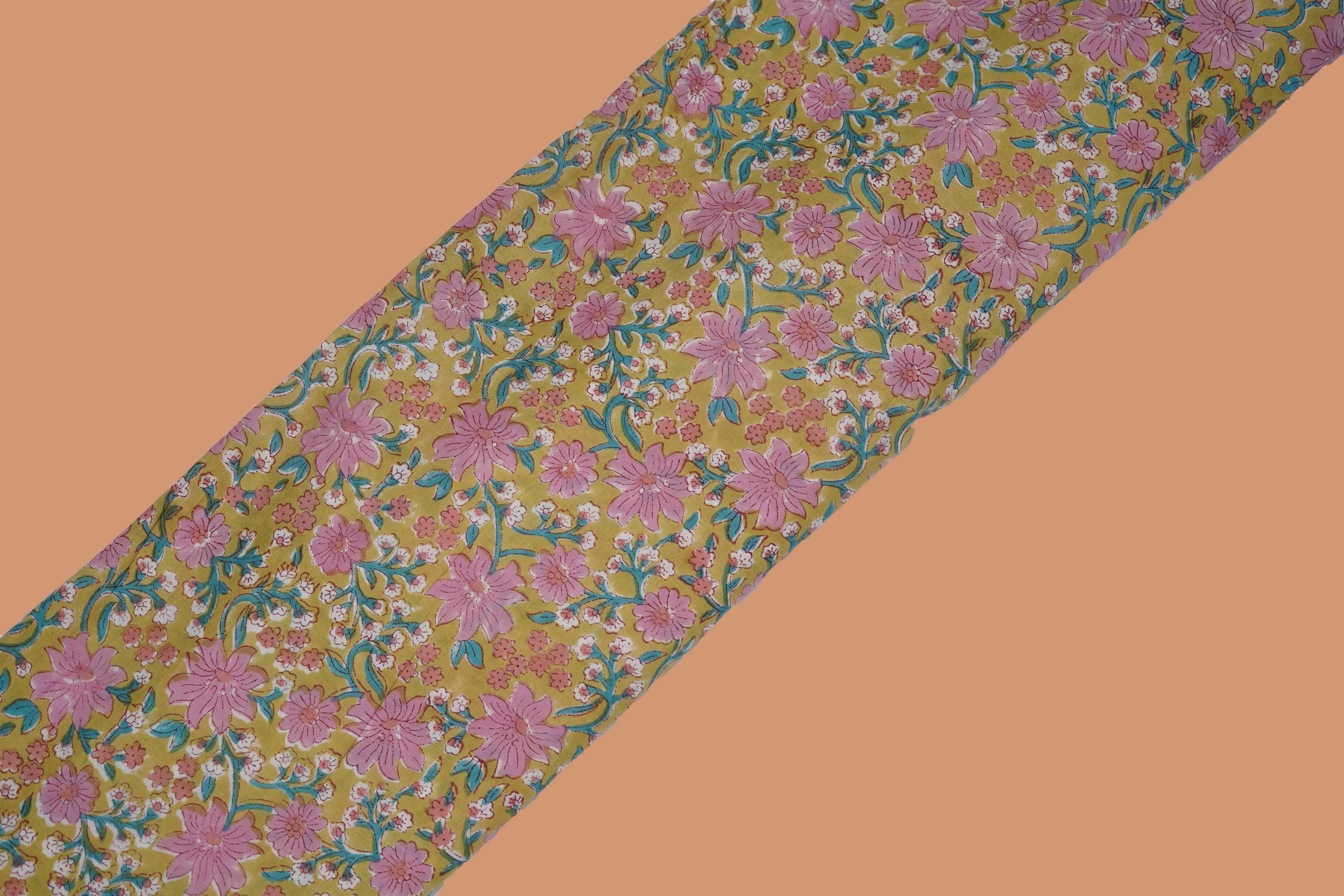 Yellow pure cotton Jaipuri fabric with beautiful pink floral block print design